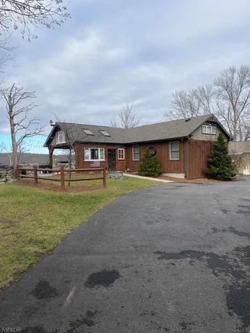 a view of house with outdoor space