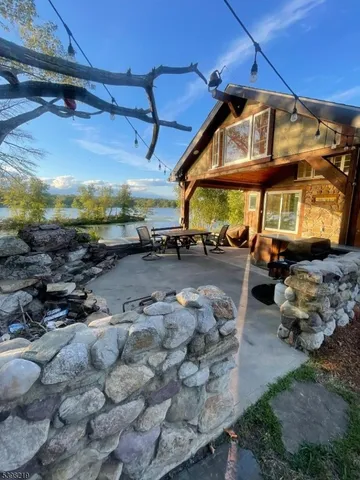 a view of a car park in front of house