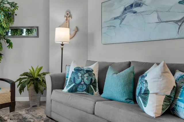 a bedroom with a bed and a night stand