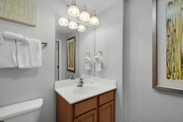 a bathroom with a shower and a sink