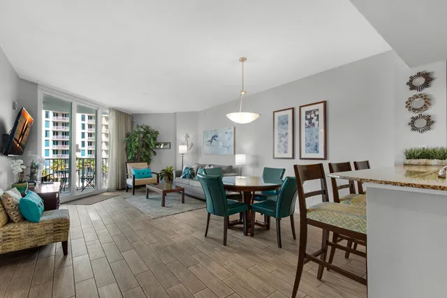 a dining room with furniture and window
