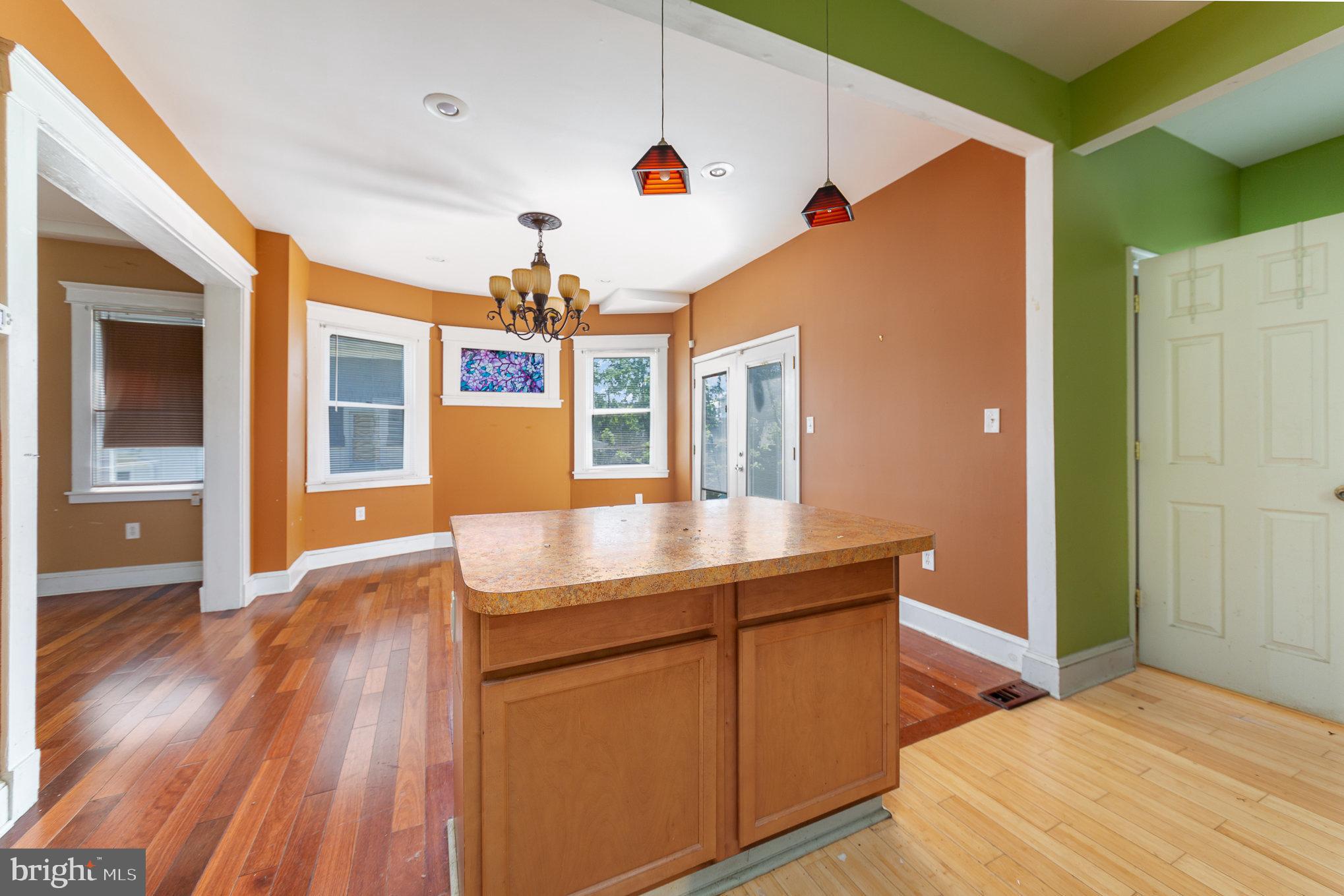 2404 Allendale Road Baltimore, MD 21216 - Photo 10 of 30 a room with wooden floor and window