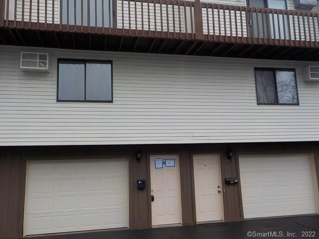 531 Meriden Road, Unit 6 Waterbury, CT 06705 - Photo 1 of 1 a front view of a house