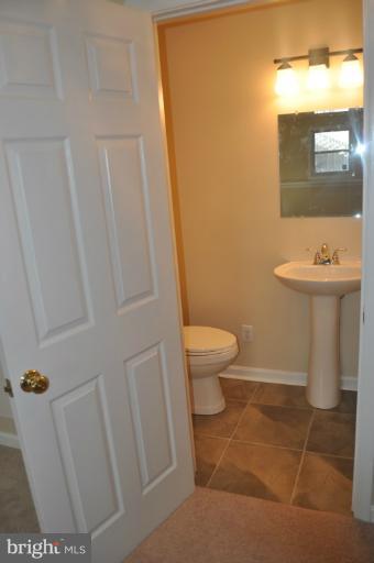 212 Ridgely Road Glen Burnie, MD 21061 - Photo 12 of 12 half bath in basement