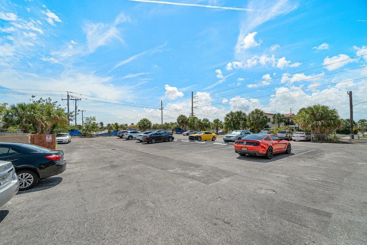 600 Southwest 2nd Street, Unit 2390 Boca Raton, FL 33486 - Photo 18 of 18 a view of street with parked cars
