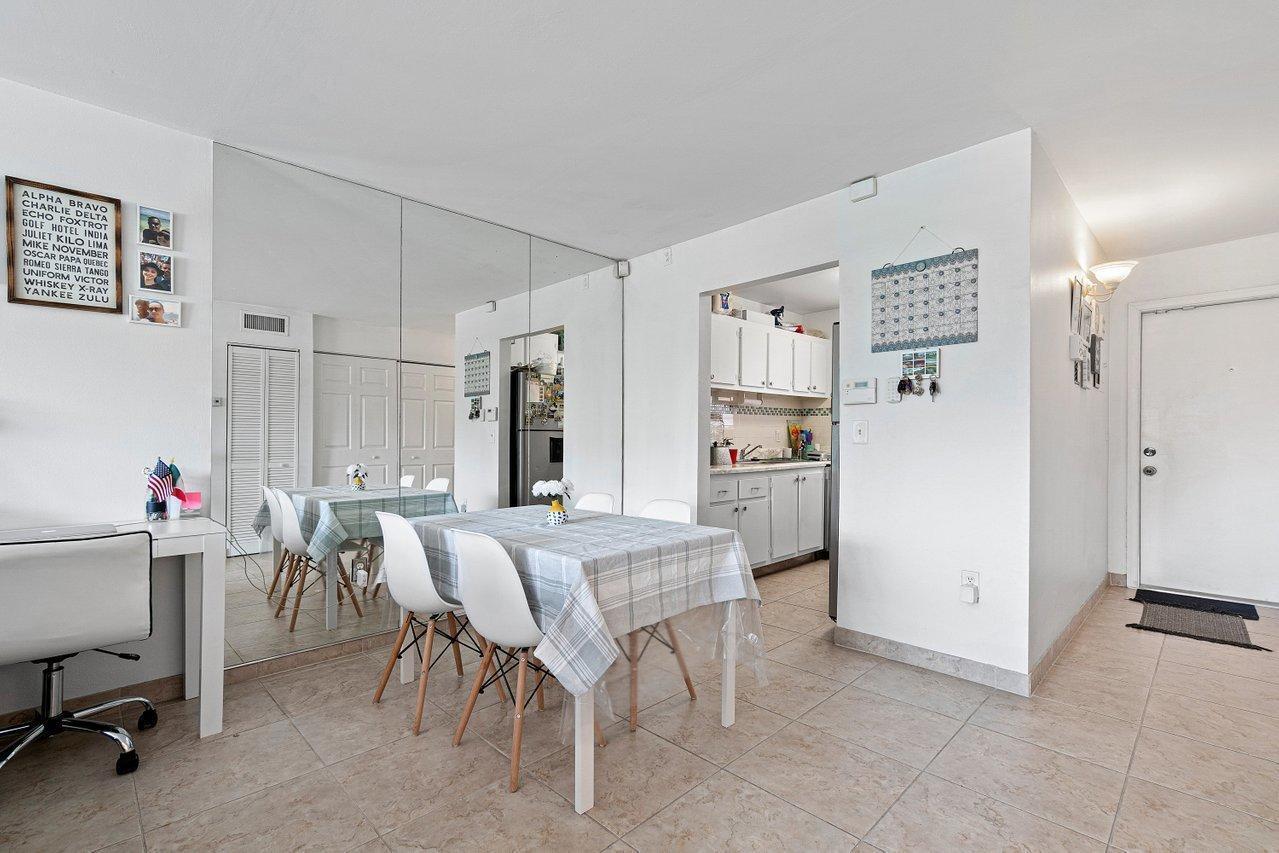 600 Southwest 2nd Street, Unit 2390 Boca Raton, FL 33486 - Photo 8 of 18 a view of a dining room with furniture