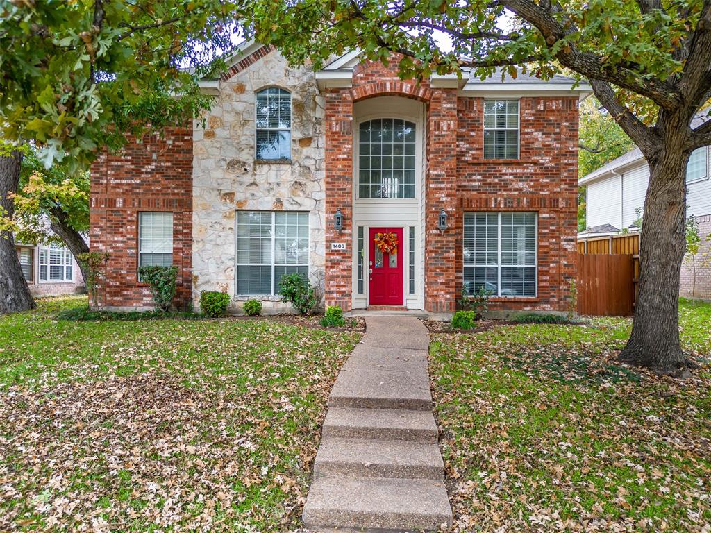 1406 Red Tip Drive Allen, TX 75002 - Photo 1 of 1 a front view of a house with a yard and trees