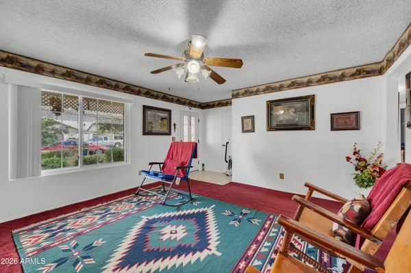 a view of a house with potted plants
