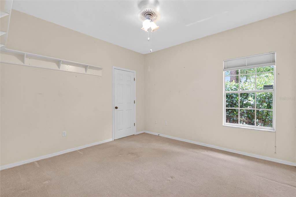 9626 Southwest 53rd Road Gainesville, FL 32608 - Photo 16 of 23 a view of an empty room with a window