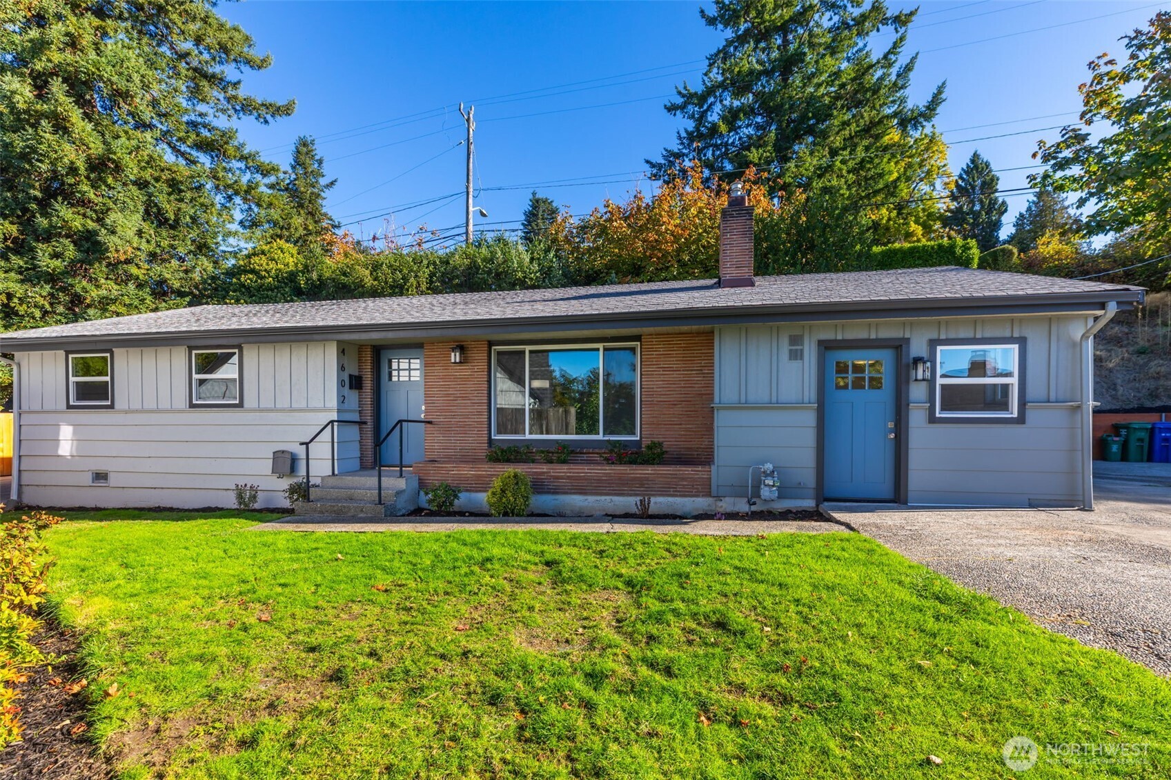 front view of a house with a yard