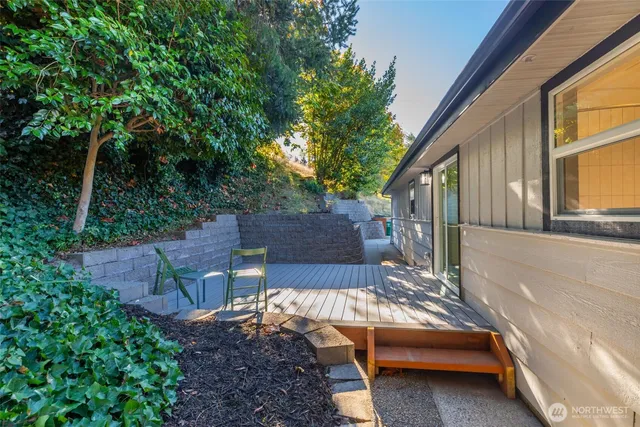 a view of backyard with a patio