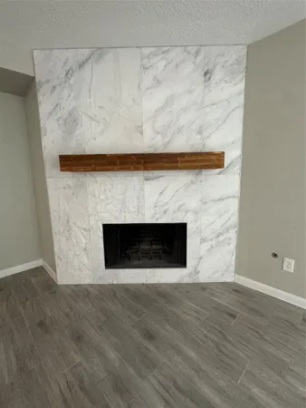 a living room with a fireplace