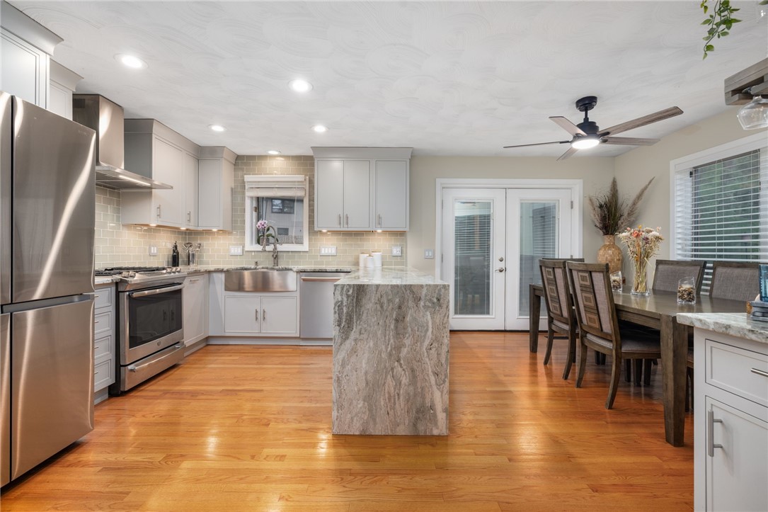 60 Club House Road Coventry, RI 02816 - Photo 33 of 50 Kitchen was renovated in 2023 with custom built cabinets and waterfall granite countertop