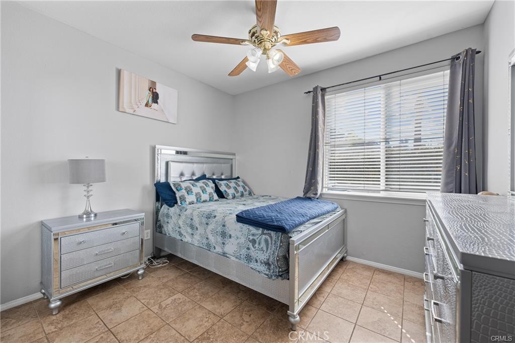 39351 Memory Drive Murrieta, CA 92563 - Photo 17 of 39 a bedroom with a bed and a window