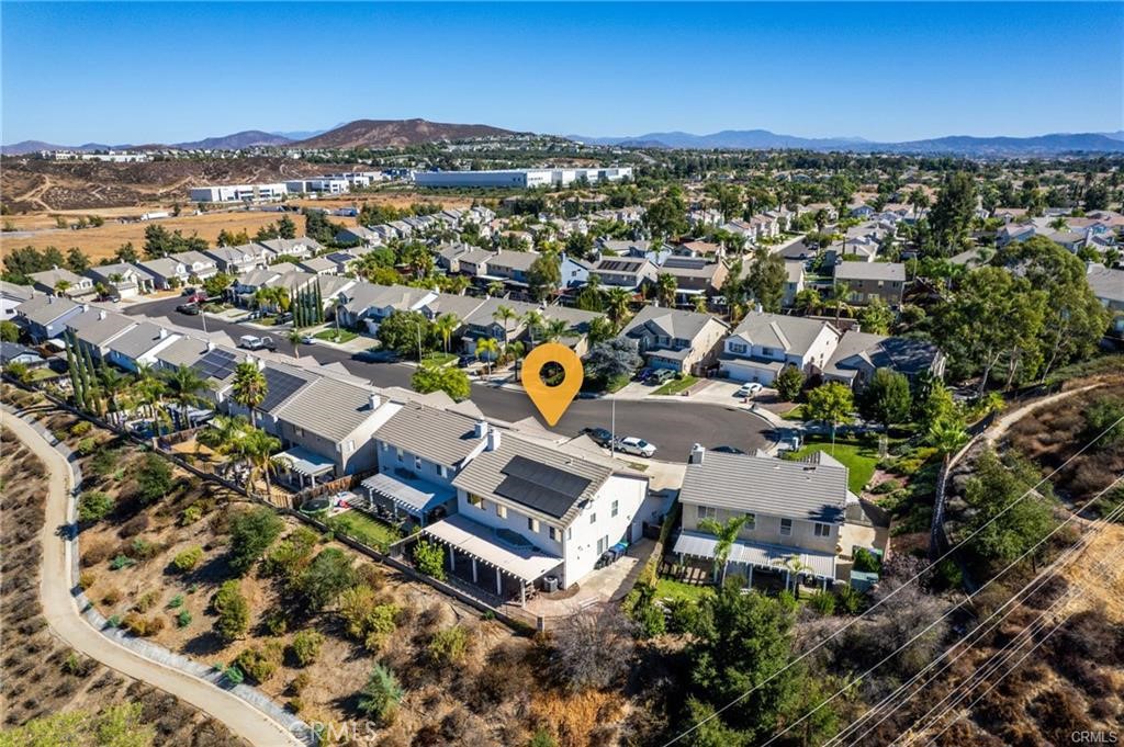 39351 Memory Drive Murrieta, CA 92563 - Photo 36 of 39 an aerial view of residential houses with outdoor space and ocean view