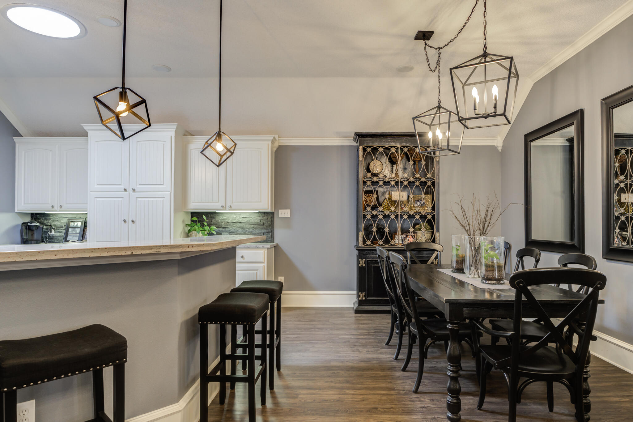 6005 83rd Street Lubbock, TX 79424 - Photo 16 of 47 a view of a dining room with furniture window and wooden floor
