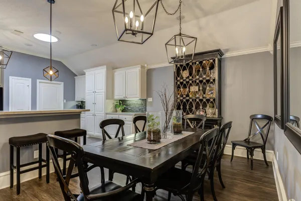 a view of a dining room and chandelier