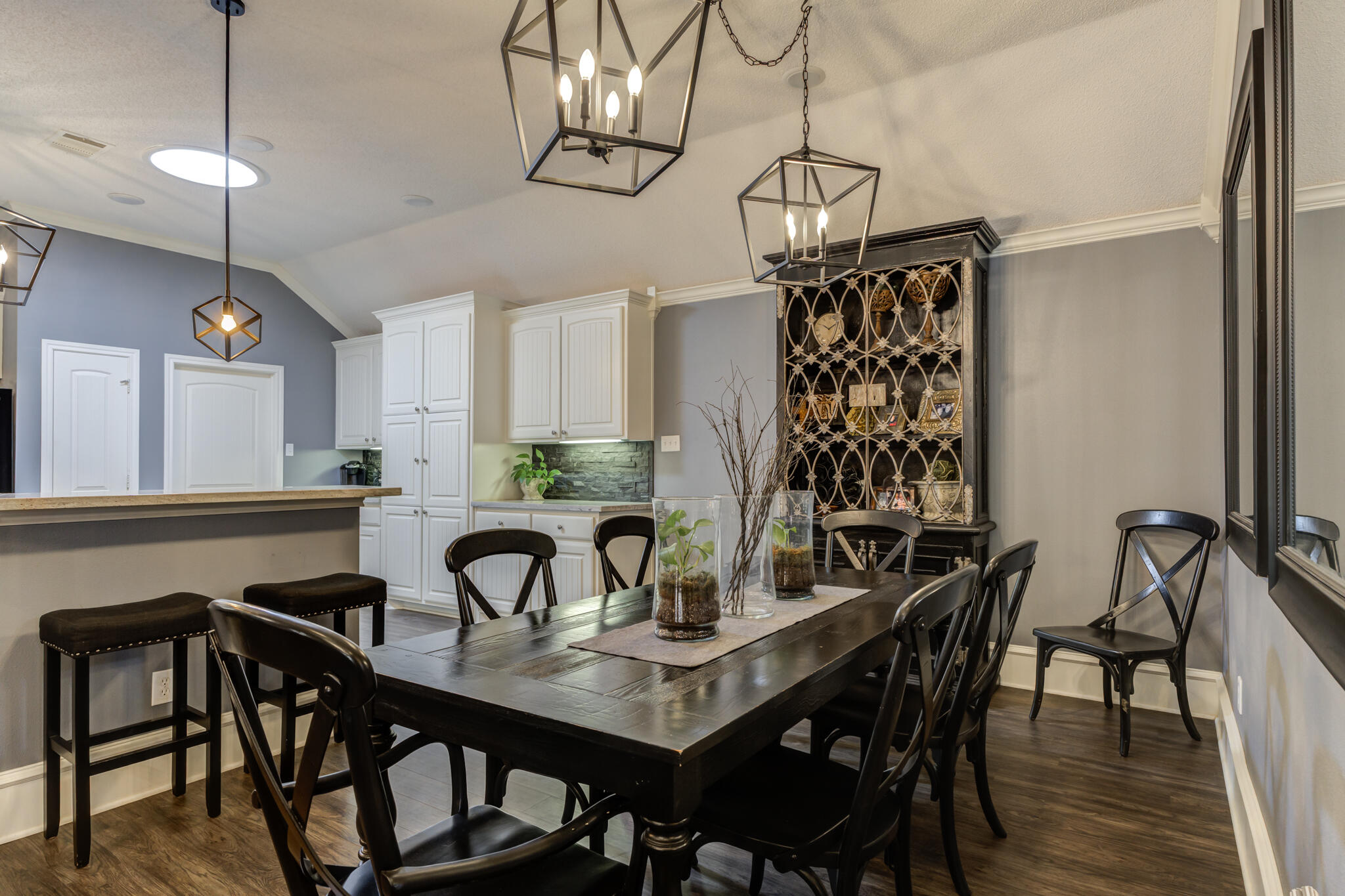 6005 83rd Street Lubbock, TX 79424 - Photo 18 of 47 a view of a dining room and chandelier