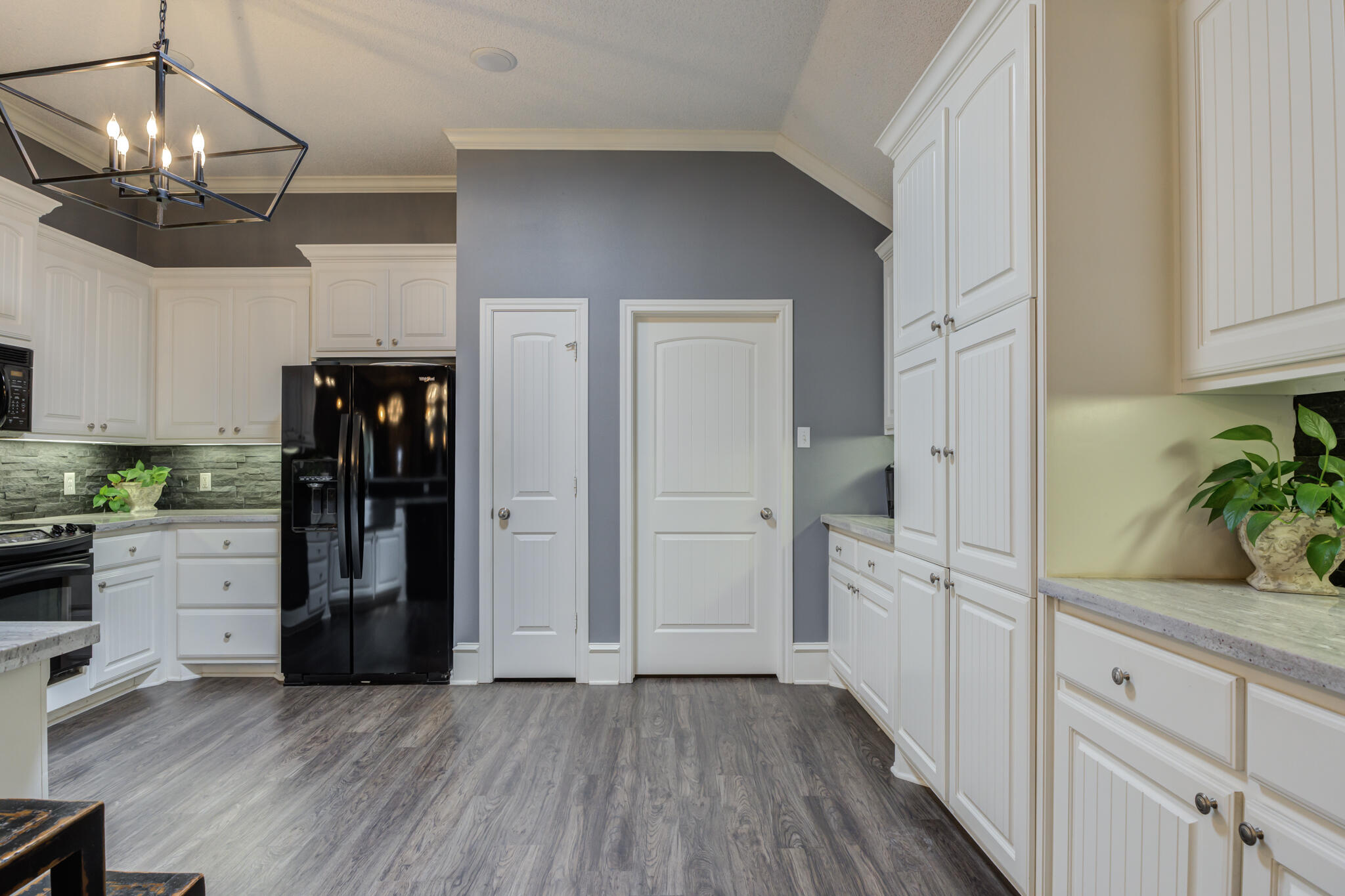 6005 83rd Street Lubbock, TX 79424 - Photo 21 of 47 a kitchen with cabinets and stainless steel appliances