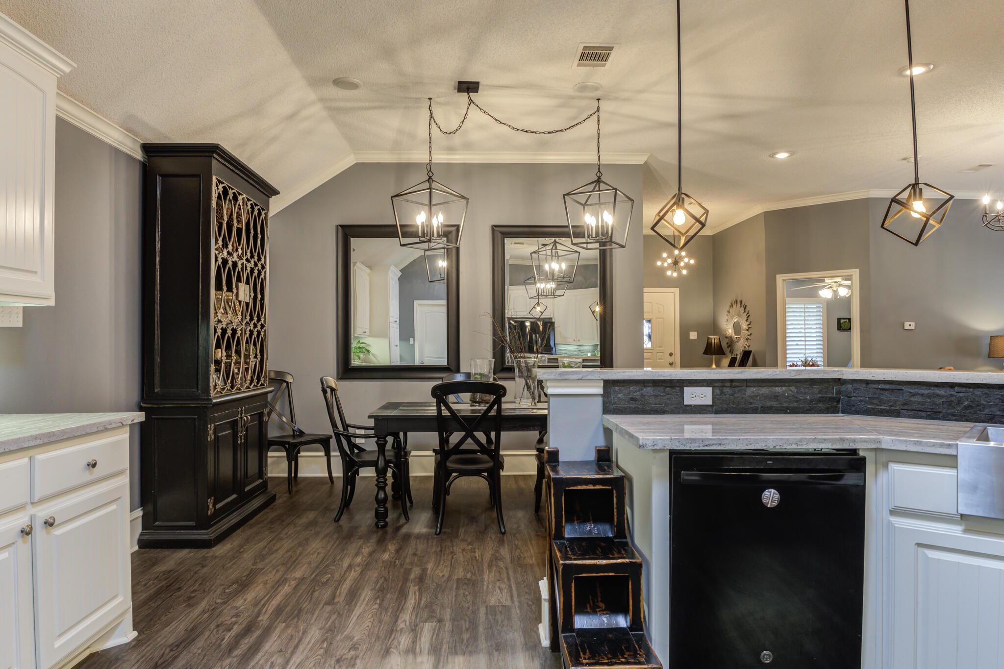 6005 83rd Street Lubbock, TX 79424 - Photo 24 of 47 a view of a a dining room with furniture window and wooden floor