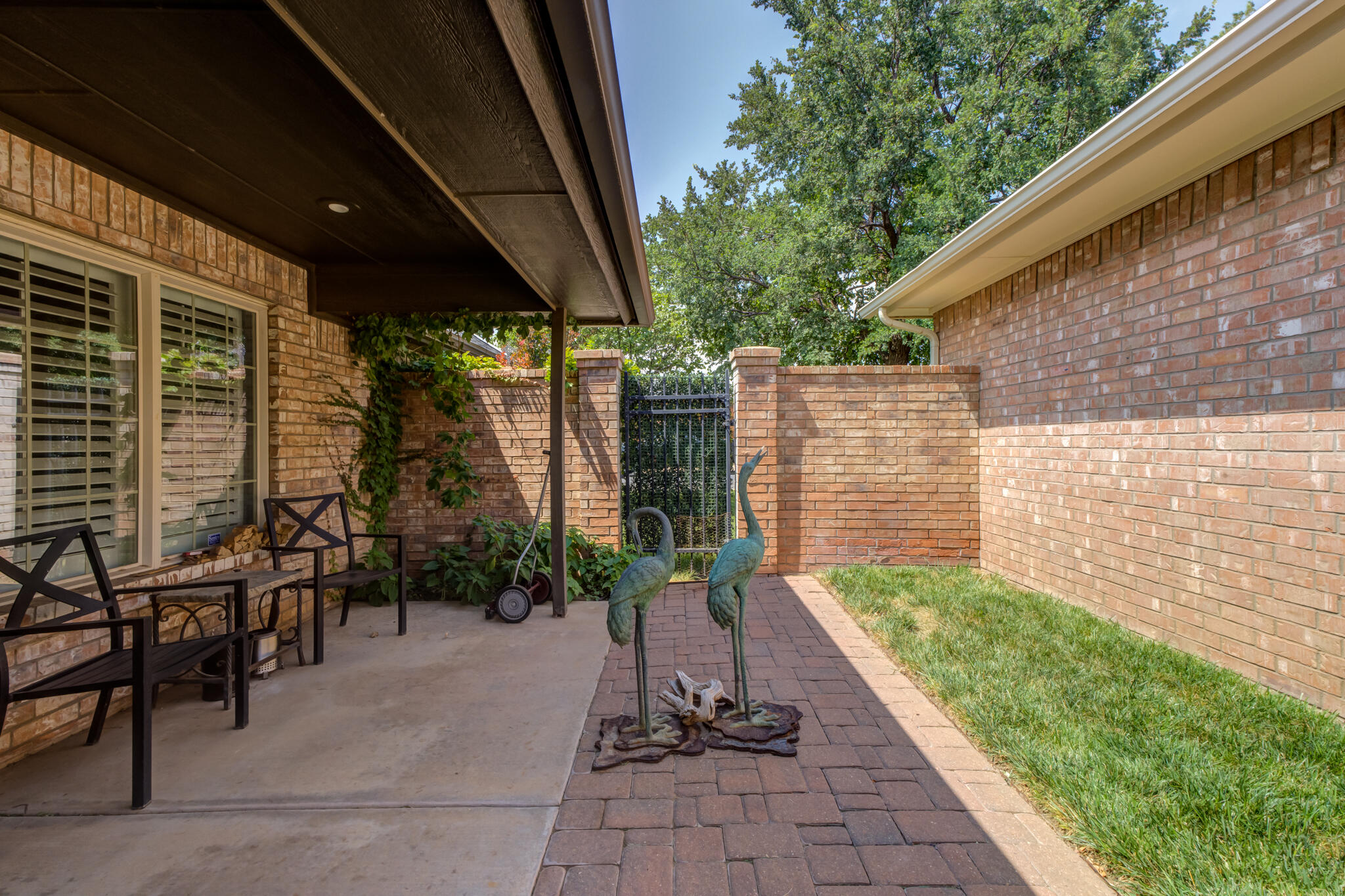 6005 83rd Street Lubbock, TX 79424 - Photo 42 of 47 a view of house with backyard and outdoor seating