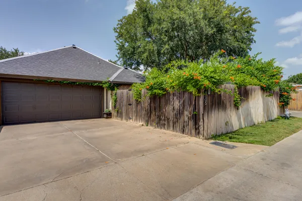 a house with trees in front of it