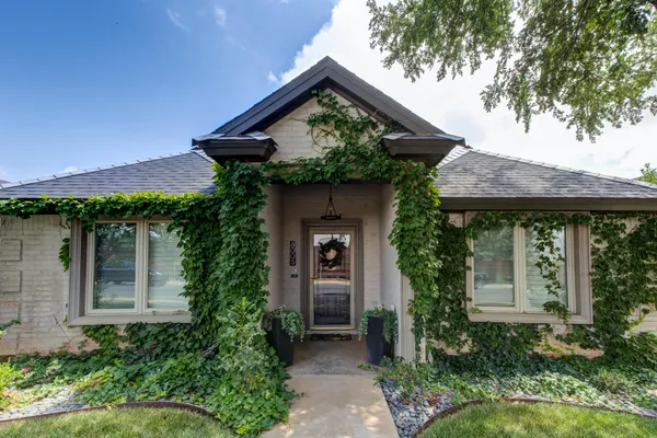 a front view of a house with porch