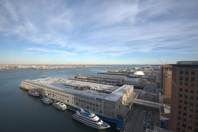 a view of a balcony with an ocean view