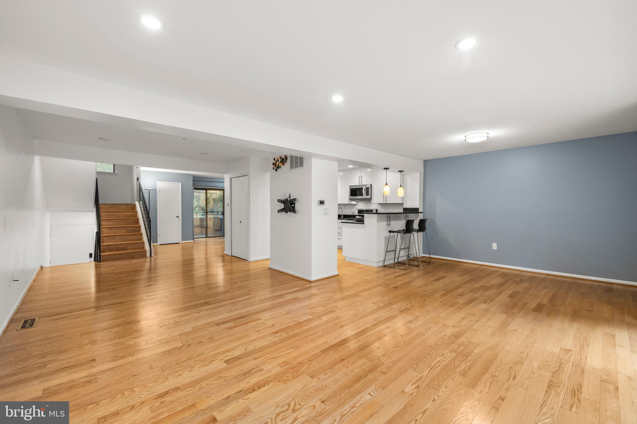 11110 Saffold Way Reston, VA 20190 - Photo 8 of 57 a view of a kitchen with a sink and a refrigerator