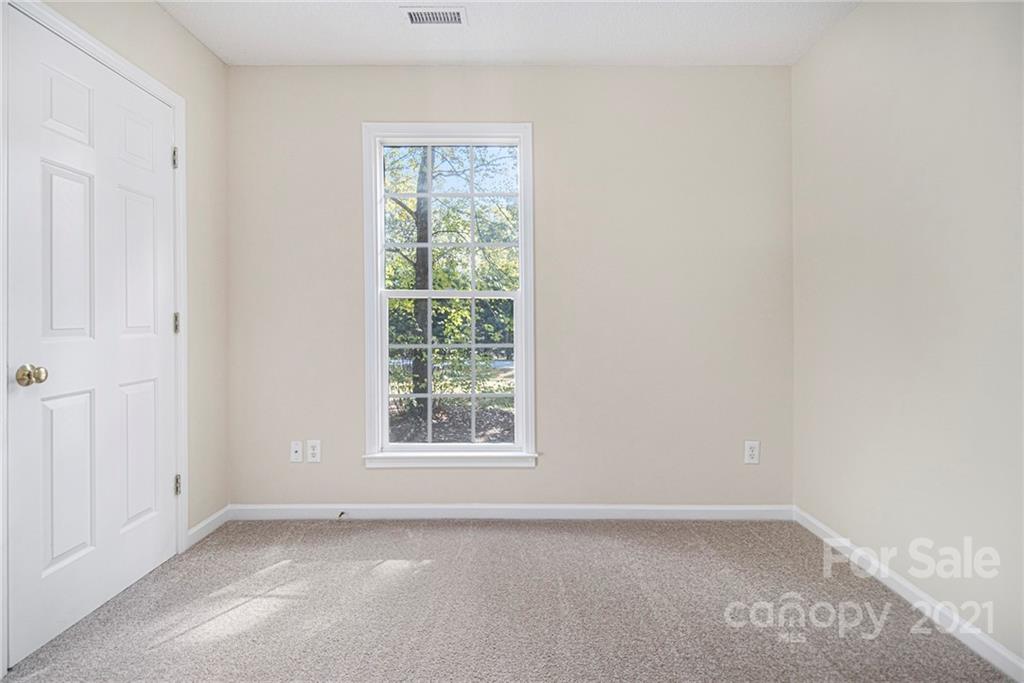 1327 Tucker Road Monroe, NC 28110 - Photo 14 of 19 an empty room with a window