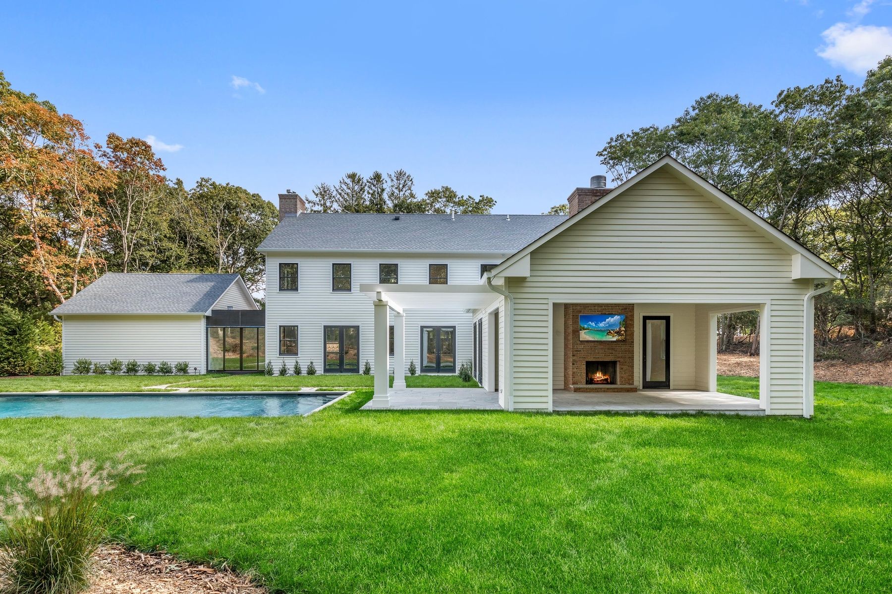 front view of a house with a yard