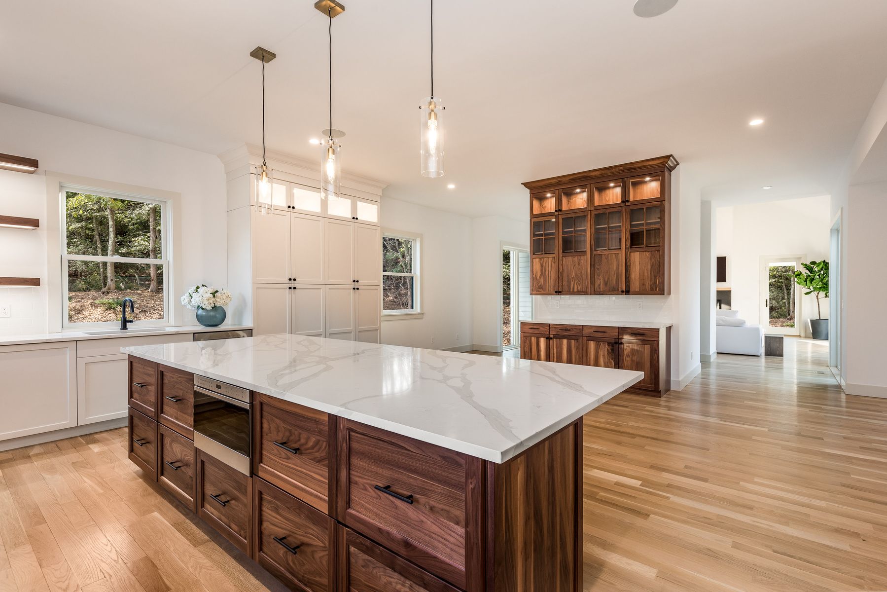 1071 North North Sea Road Southampton, NY 11968 - Photo 5 of 15 a open kitchen with stainless steel appliances granite countertop a stove and a wooden floors