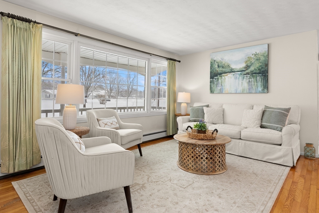 12 Tulane Road Danvers, MA 01923 - Photo 12 of 25 a living room with furniture and a large window
