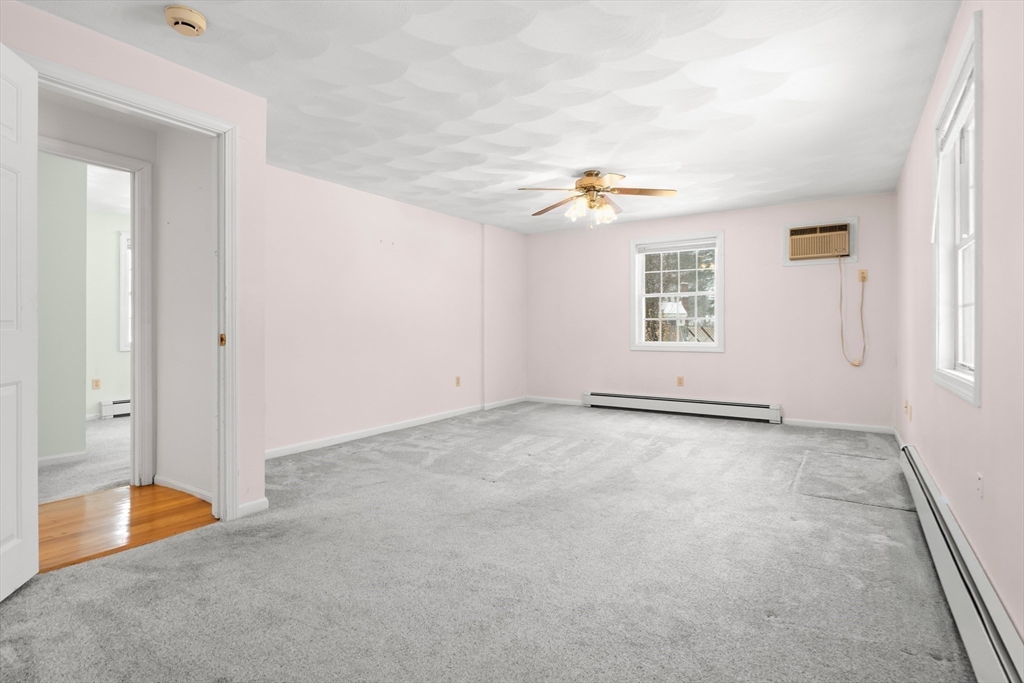 12 Tulane Road Danvers, MA 01923 - Photo 19 of 25 an empty room with windows and fan