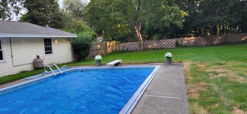 12 Tulane Road Danvers, MA 01923 - Photo 6 of 25 a view of a backyard with a garden