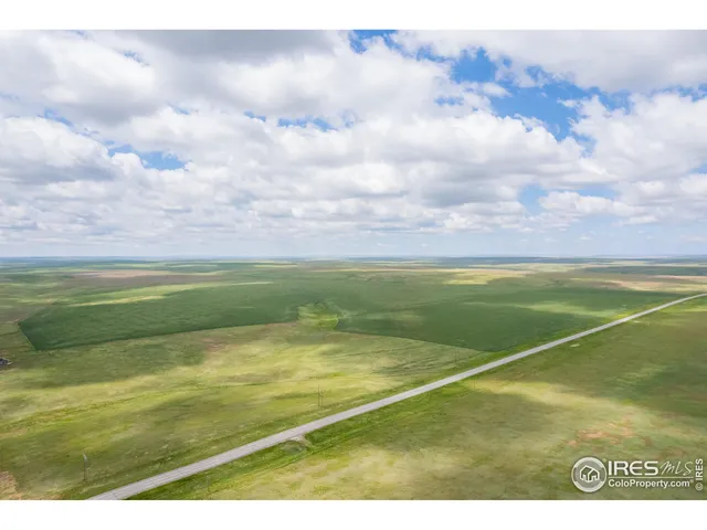 a view of an outdoor space and tennis court