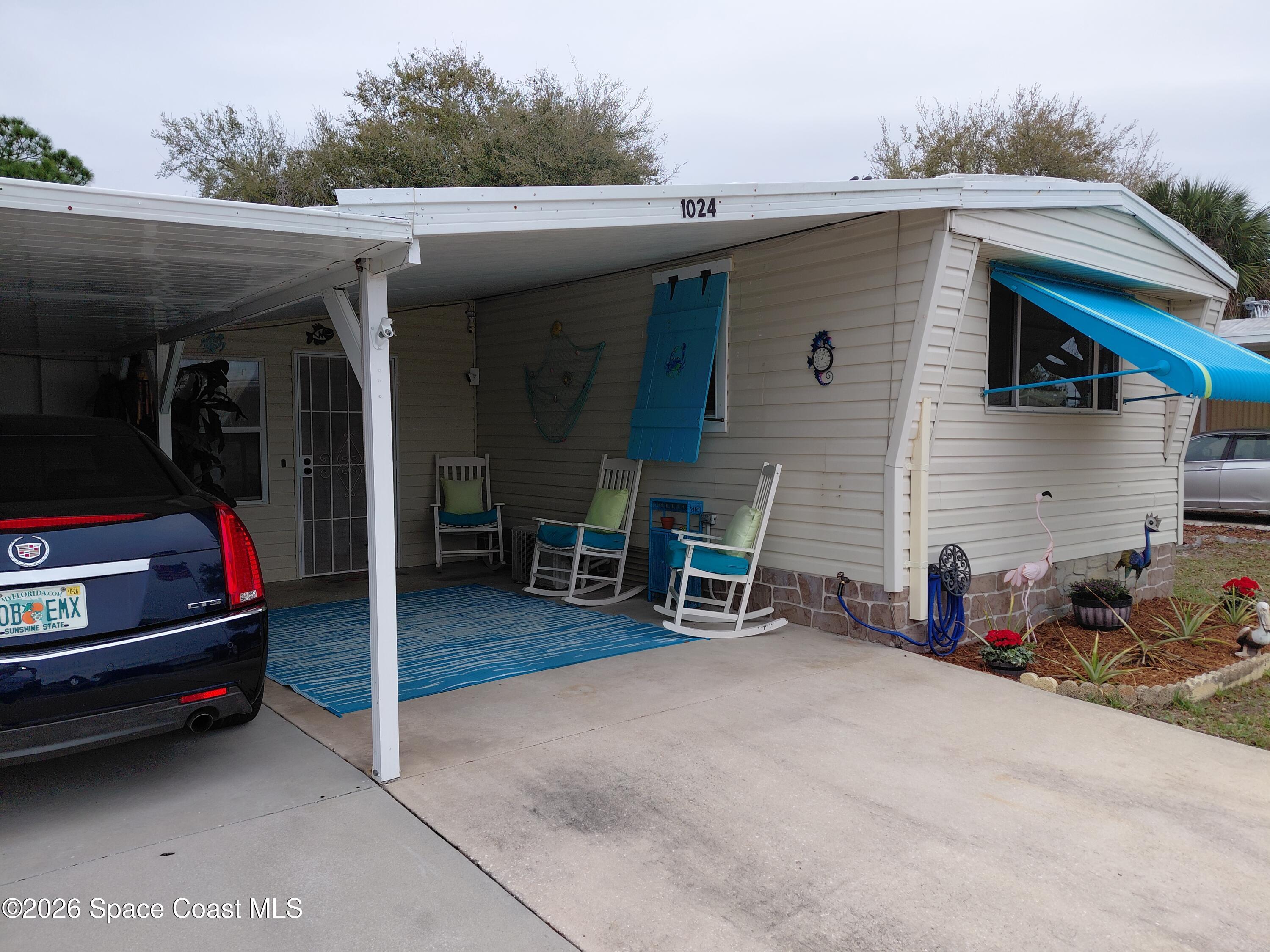 1024 Sebastian Road Barefoot Bay, FL 32976 - Photo 2 of 50 20260317_125536