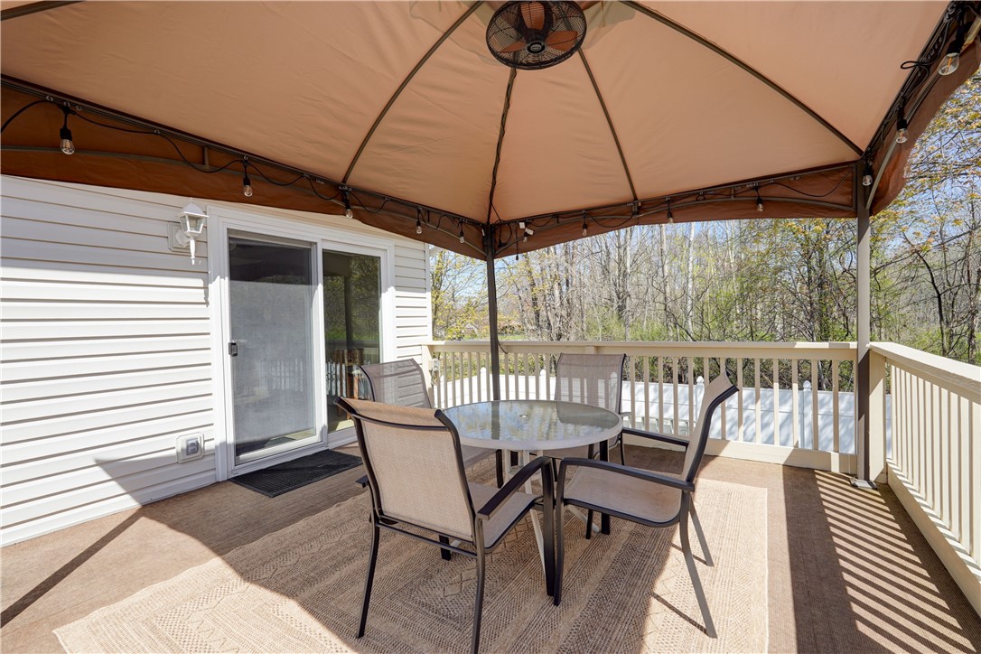 601 Gilmore Road Clarkson, NY 14420 - Photo 37 of 48 Deck off of kitchen w/Pergola, lights & fan includ
