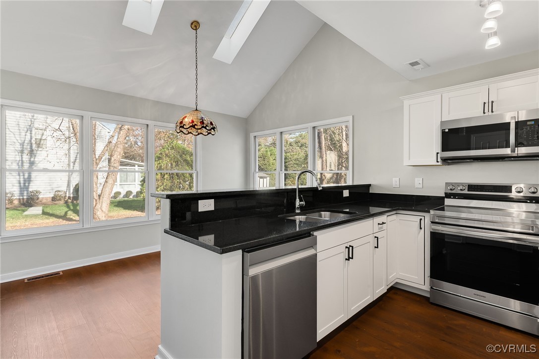 1301 Tree Ridge Road Henrico, VA 23231 - Photo 12 of 33 a kitchen with granite countertop a sink and a stove top oven