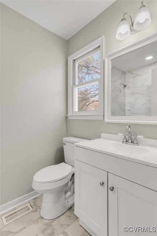 1301 Tree Ridge Road Henrico, VA 23231 - Photo 17 of 33 a bathroom with a granite countertop toilet a sink and mirror