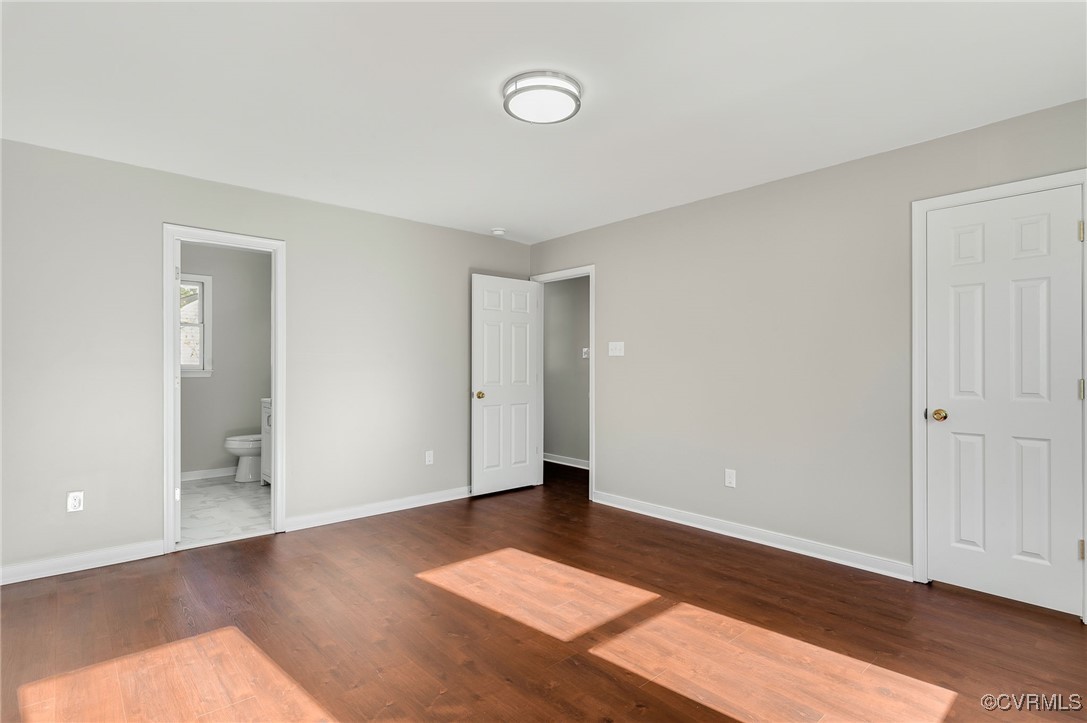 1301 Tree Ridge Road Henrico, VA 23231 - Photo 19 of 33 a view of an empty room with wooden floor and window