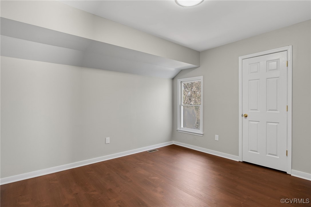 1301 Tree Ridge Road Henrico, VA 23231 - Photo 23 of 33 an empty room with wooden floor and closet