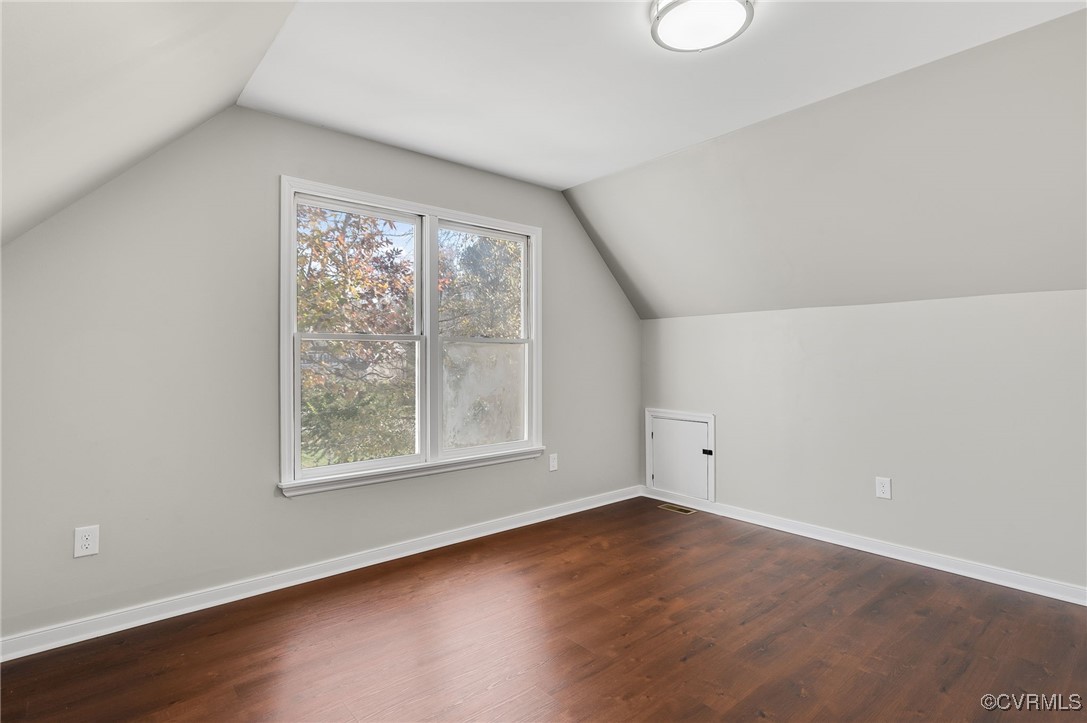 1301 Tree Ridge Road Henrico, VA 23231 - Photo 25 of 33 an empty room with wooden floor and windows