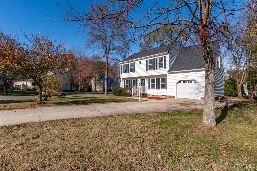 1301 Tree Ridge Road Henrico, VA 23231 - Photo 5 of 33 a front view of a house with a yard