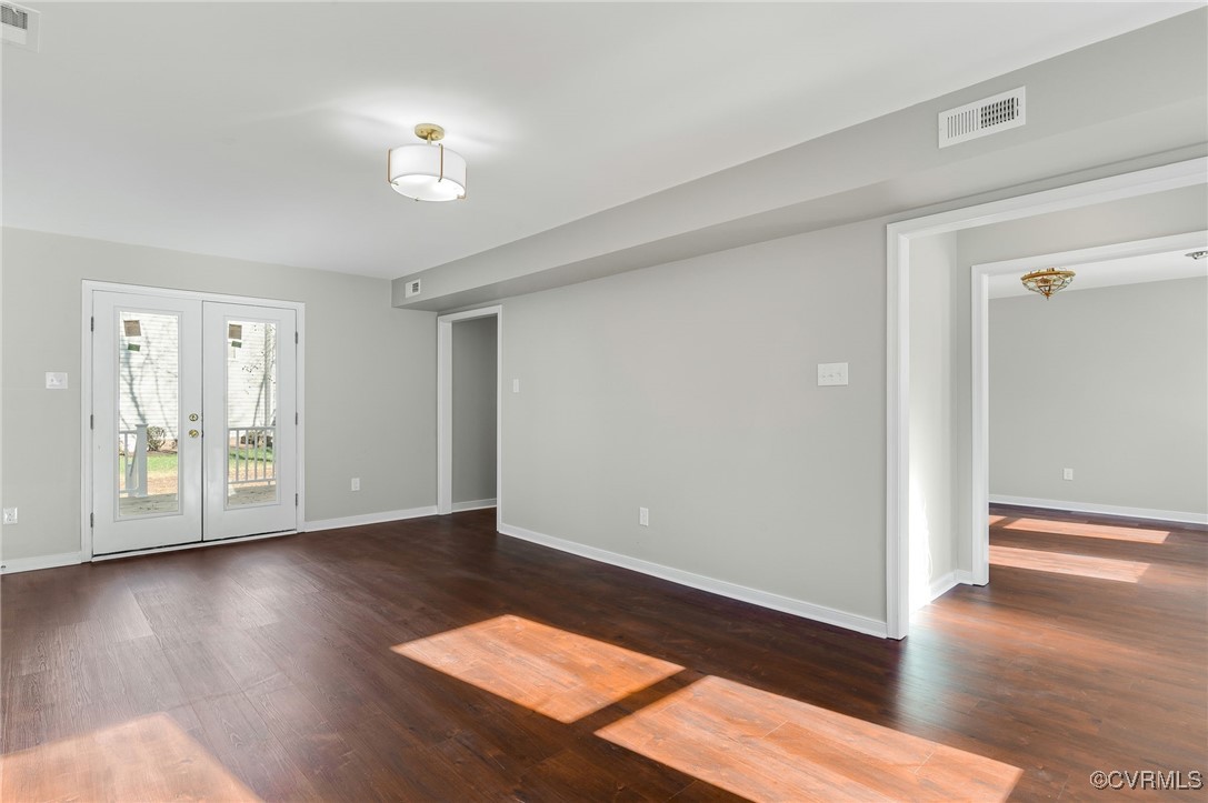 1301 Tree Ridge Road Henrico, VA 23231 - Photo 8 of 33 a view of wooden floor and windows in a room