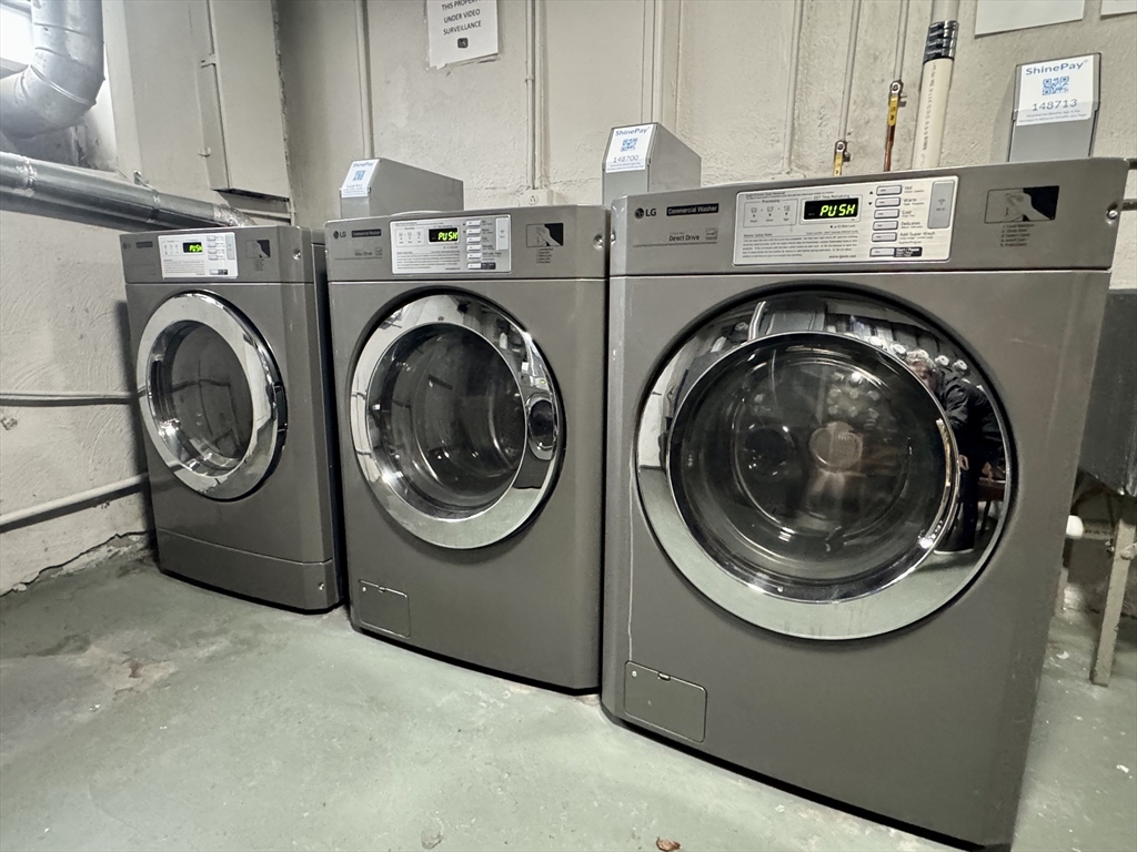 97 Spring Street, Unit C6 Boston, MA 02132 - Photo 7 of 8 a utility room with dryer and washer