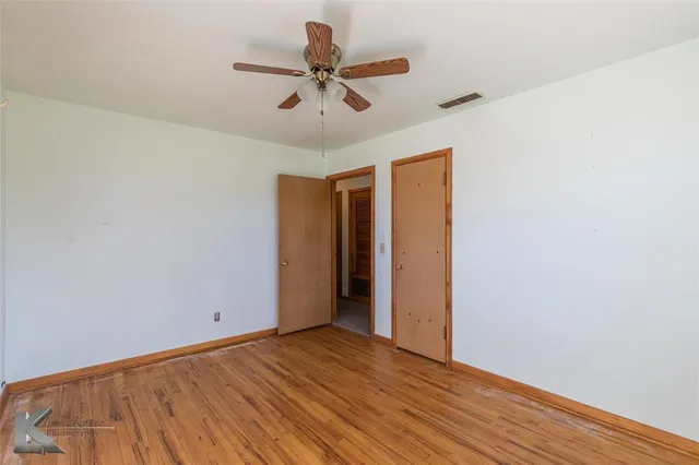 a room with storage and window