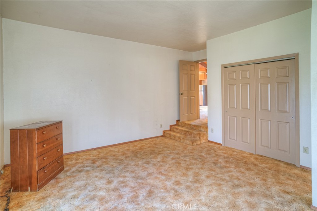 15 Hide A Way Road Oroville, CA 95966 - Photo 15 of 63 an empty room with closet area