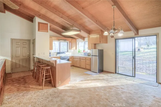 a utility room with sink dryer and washer