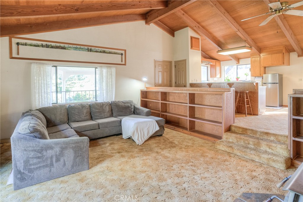 15 Hide A Way Road Oroville, CA 95966 - Photo 31 of 63 a living room with furniture cabinets and a window
